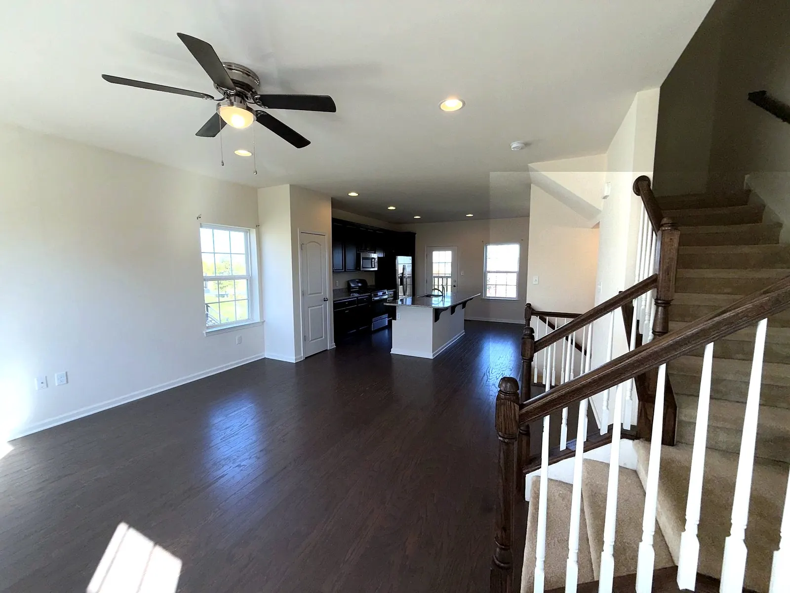 Family room with ceiling fan