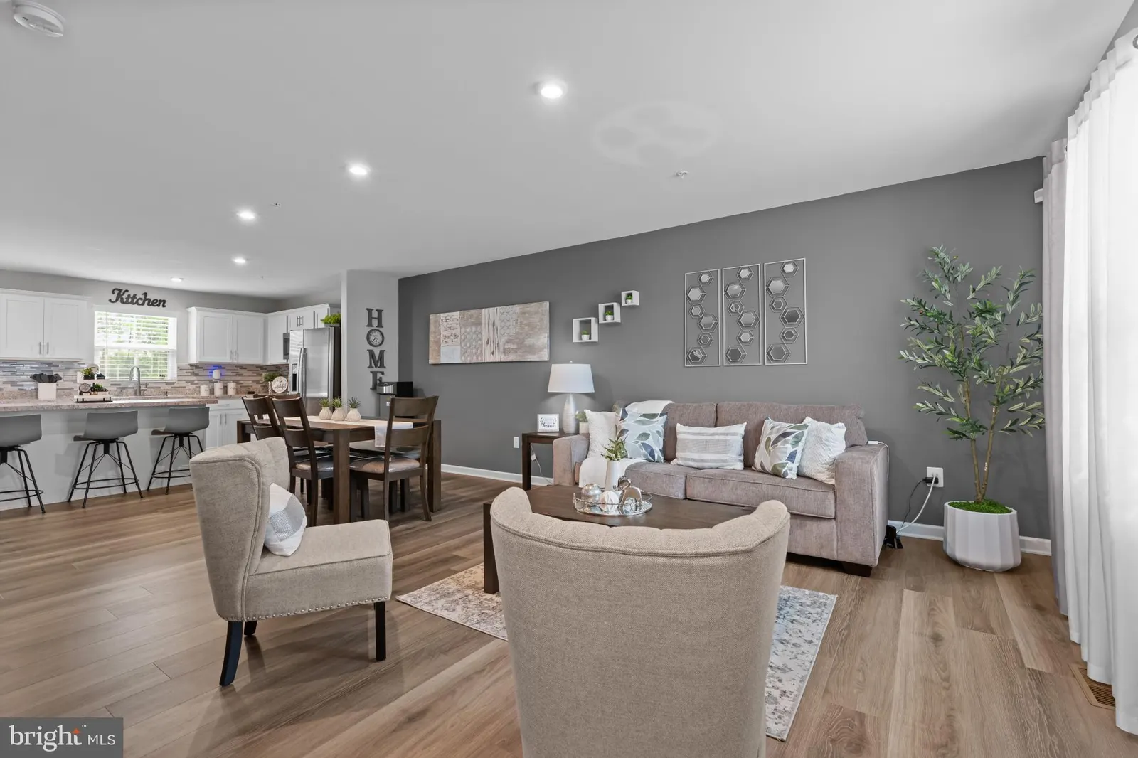 Great room open to the dining area and kitchen